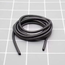 Metallic spiral cable protector for charging cables